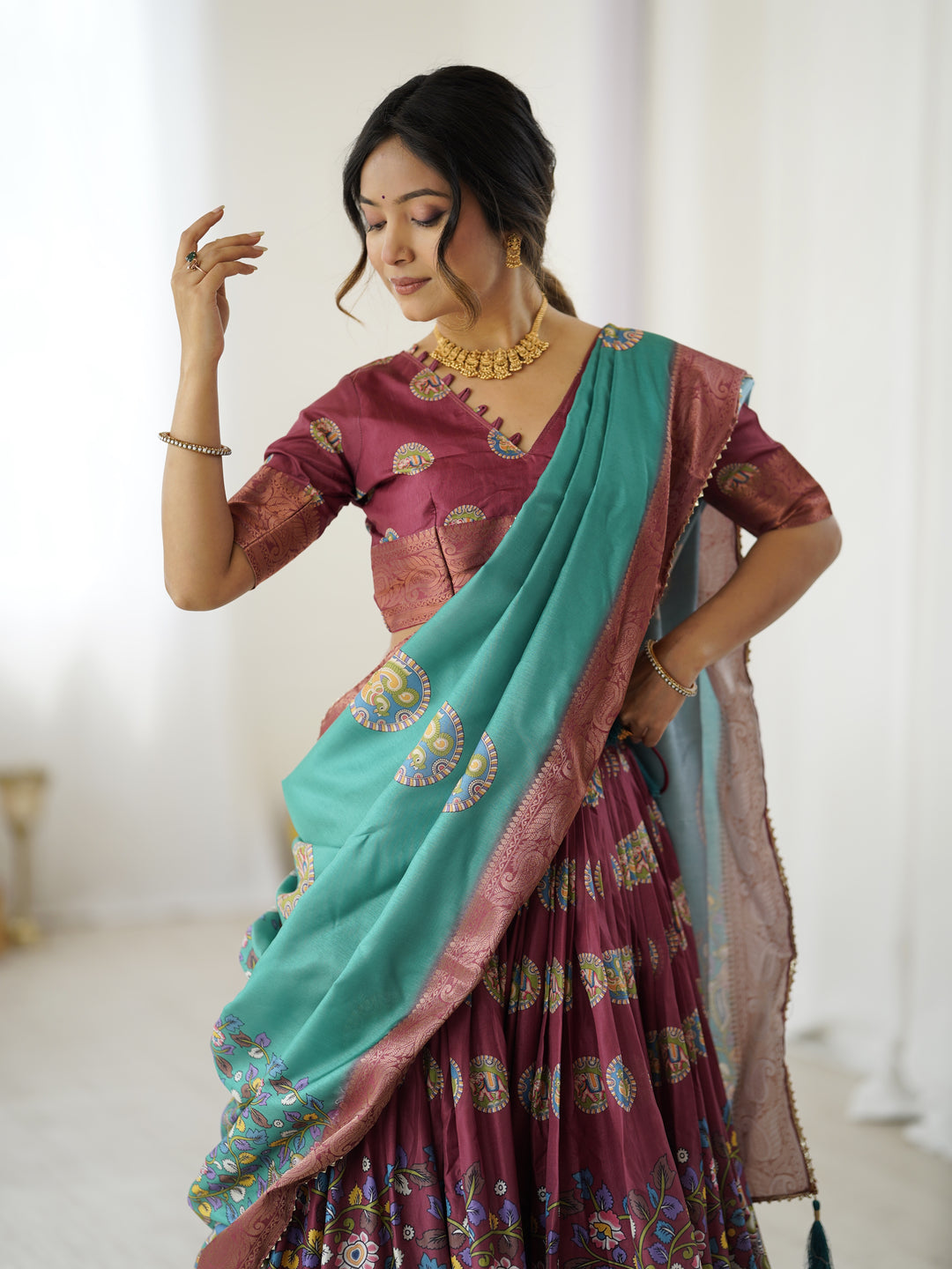 Wine & Teal Kalamkari Tussar Silk Lehenga with Zari Border & Tassel Dupatta – Festive & Wedding Wear