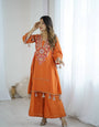 Hand-Embroidered Designer Peplum & Bell Bottom Set with Real Mirror Work Orange Kurta Set with Pink Tassels – Ethnic Festive Wear for Women
