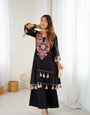 Hand-Embroidered Designer Peplum & Bell Bottom Set with Real Mirror Work Black Kurta Set with Pink Tassels – Ethnic Festive Wear for Women