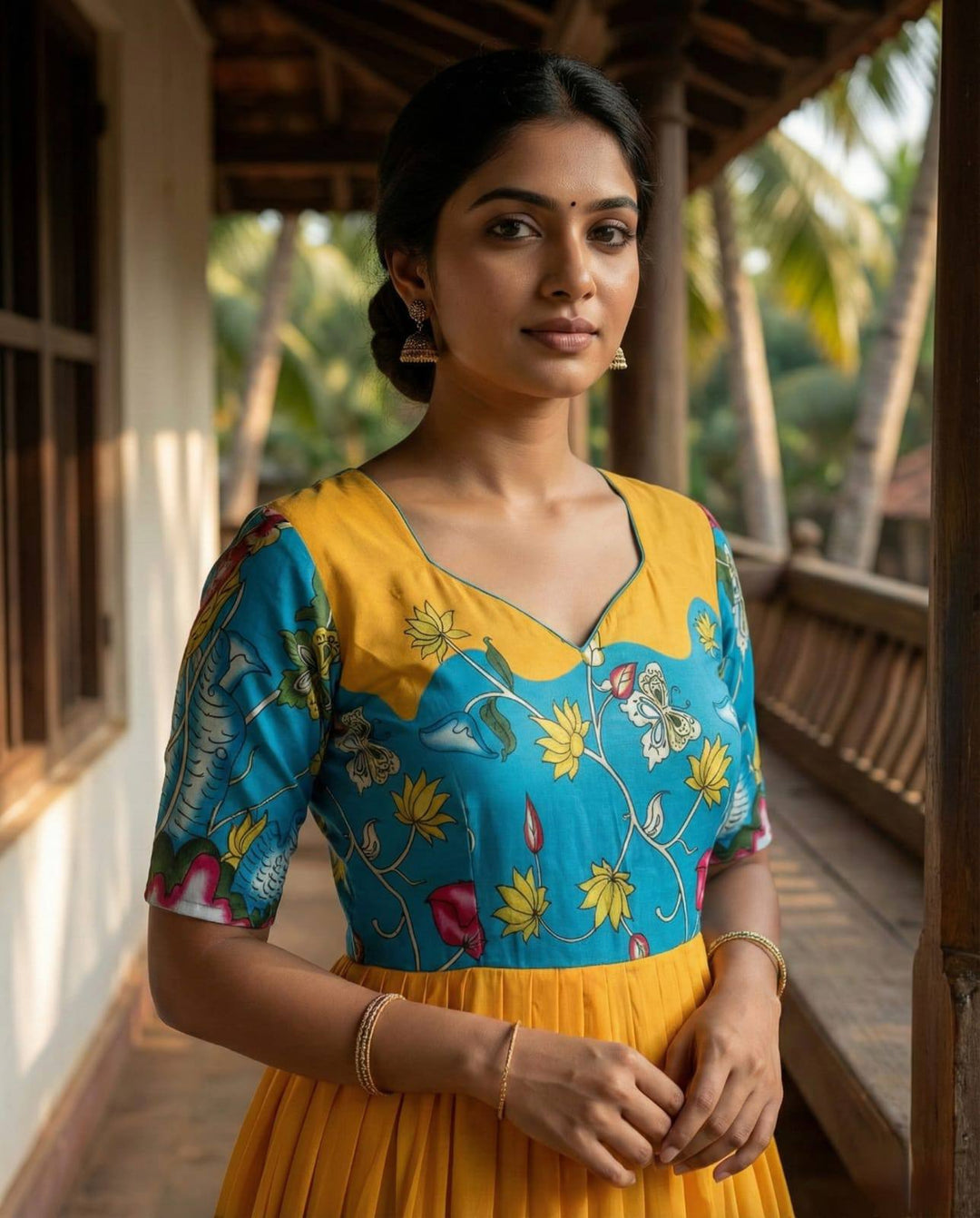 Sunshine yellow Kalamkari Printed Maslin Gown