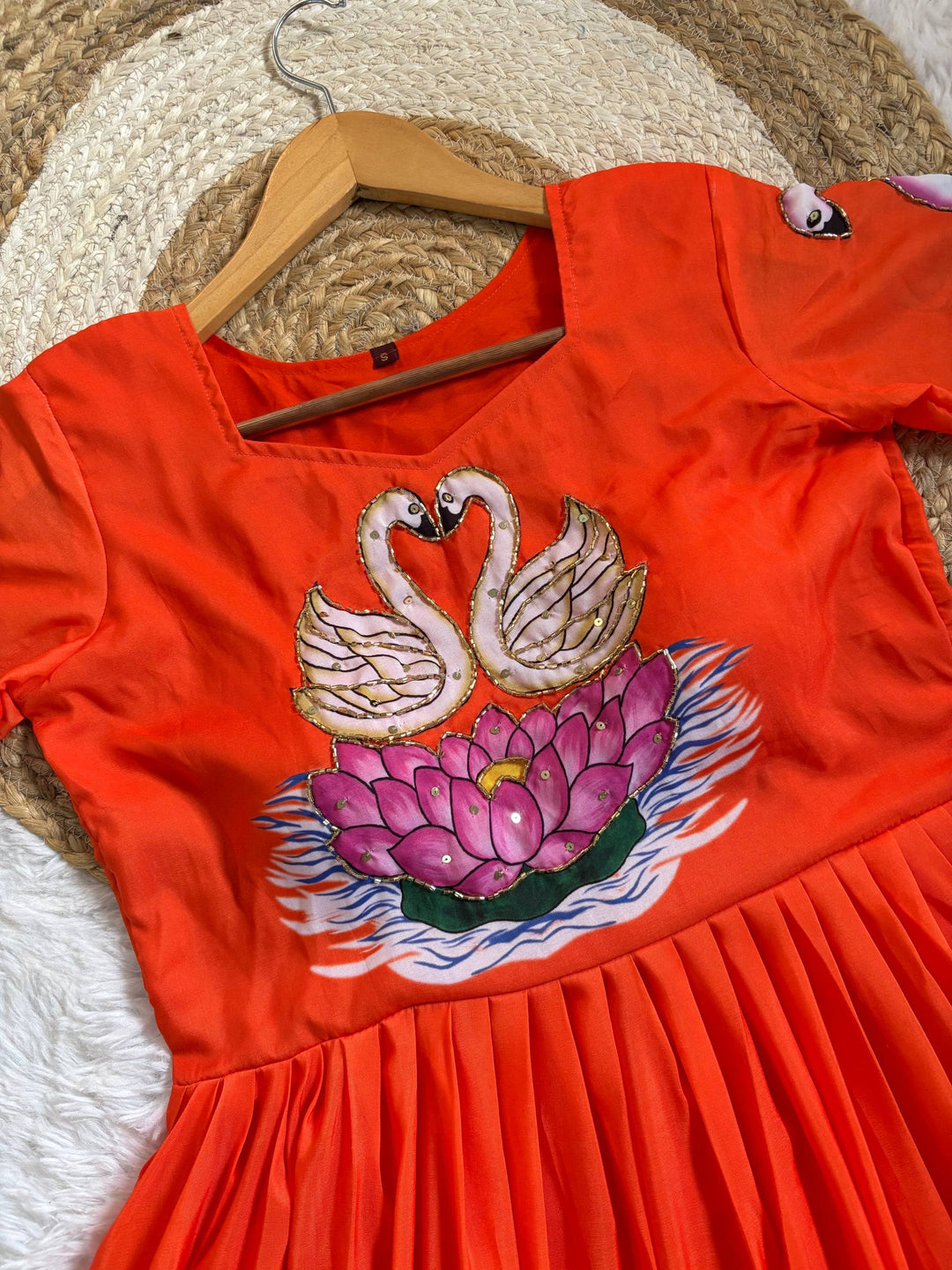 Radiant Orange Muslin Gown with Hand-Painted Swan & Khatli Art