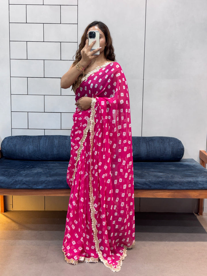 Hot Pink Bandhani Georgette Saree with embroidery Lace Border & Matching Blouse Piece