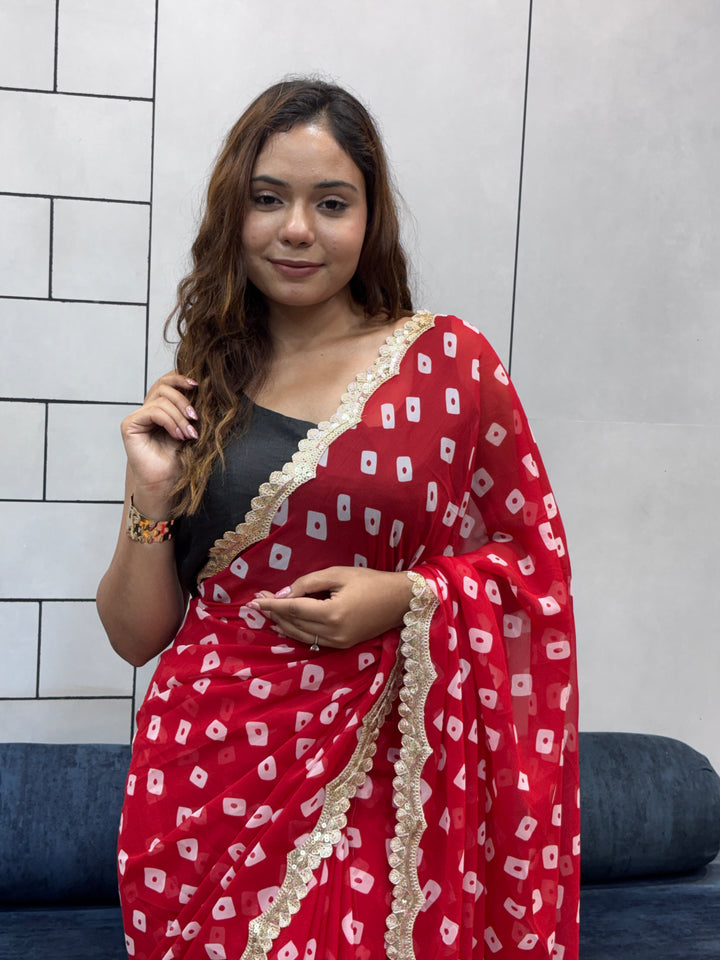 Crimson Red Bandhani Georgette Saree with embroidery Lace Border & Running Blouse