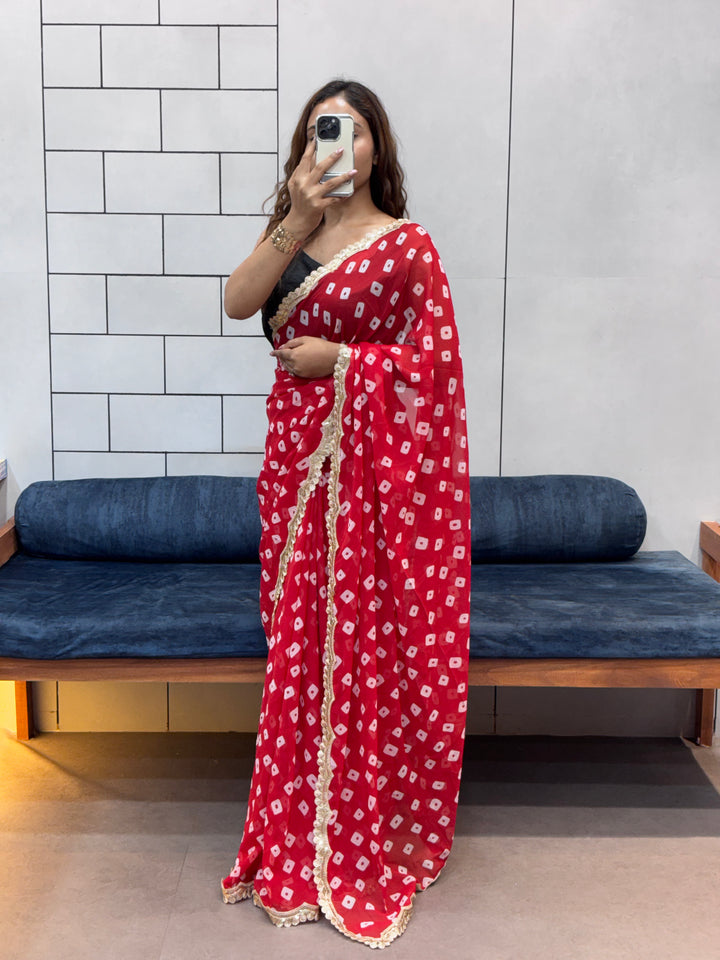 Crimson Red Bandhani Georgette Saree with embroidery Lace Border & Running Blouse